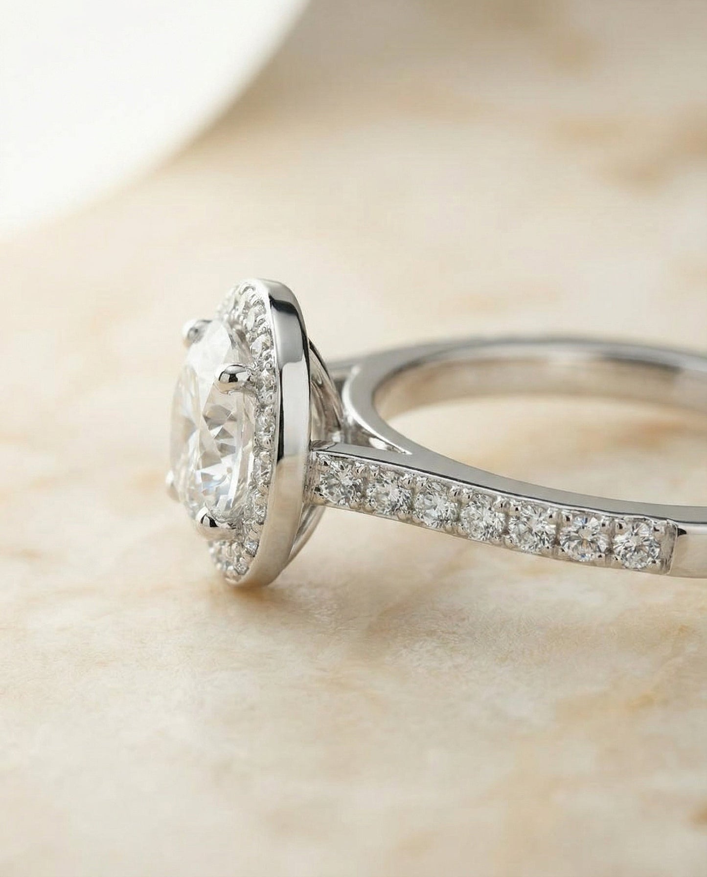 Round Brilliant, Classic French Pavé Halo, in 18K White Gold, pave setting – side profile | RockHer