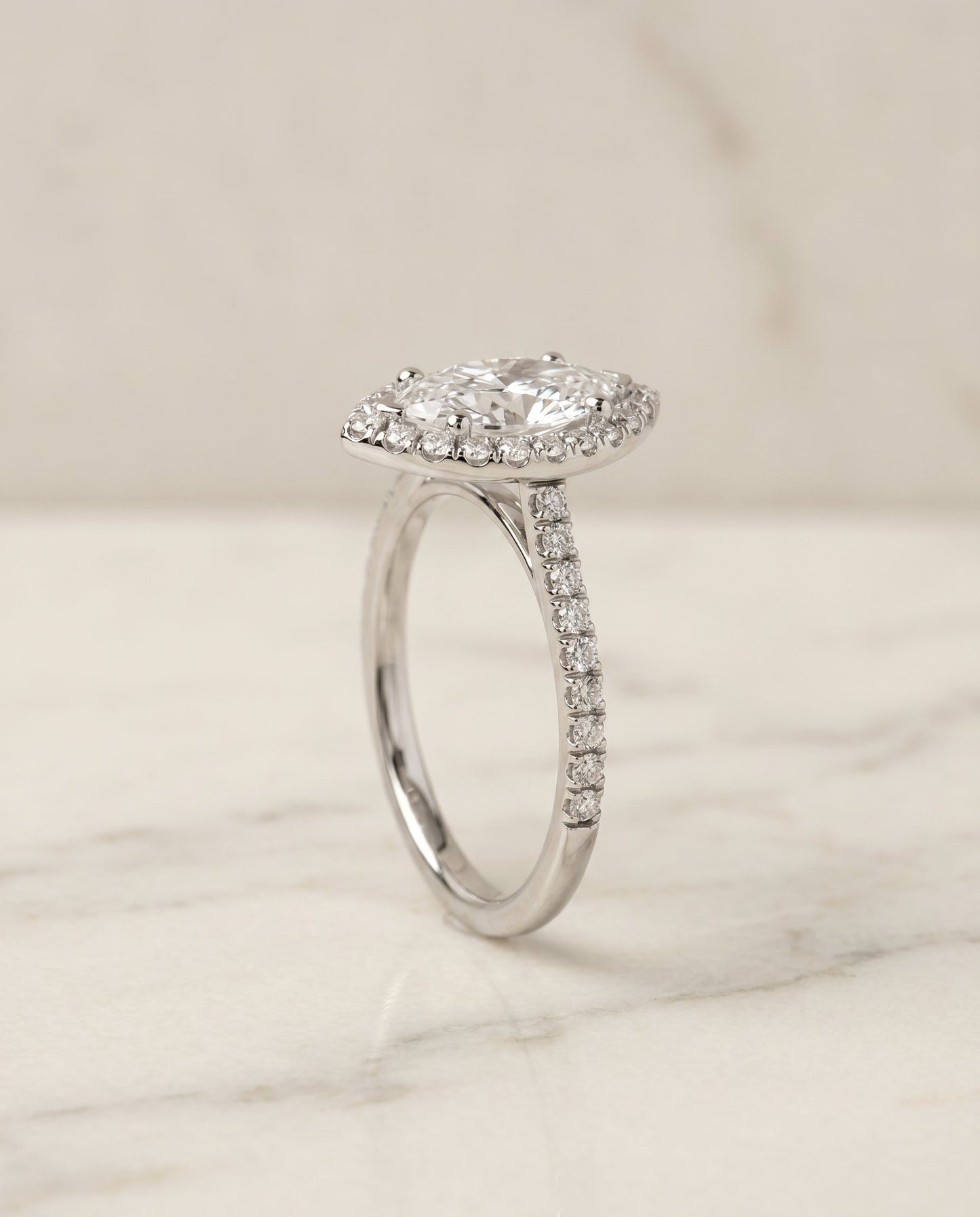 Classic French Pavé Halo Linear Marquise, in Platinum, pave setting – front view | RockHer