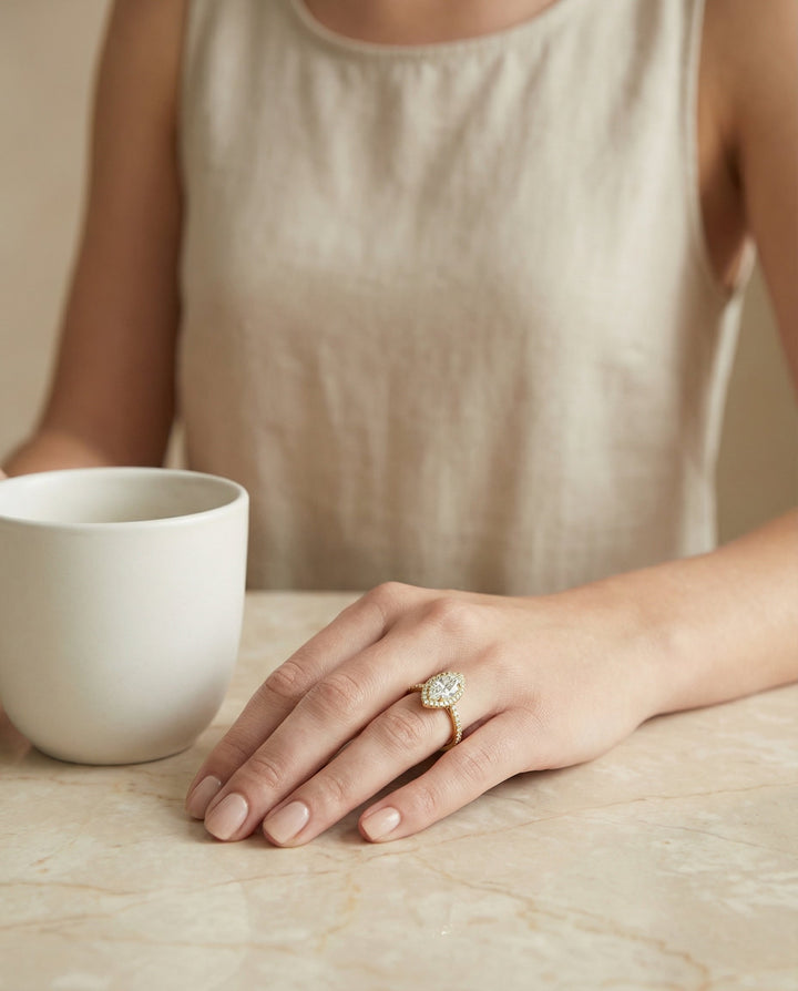 Classic French Pavé Halo Linear Marquise, in 18K Yellow Gold, pave setting – lifestyle shot | RockHer