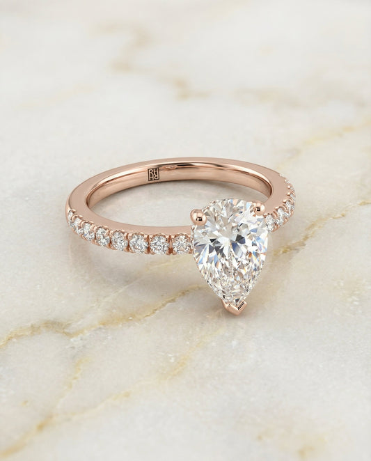 Classic Linear French Pavé Pear Shape, in 14K Rose Gold – angled view | RockHer