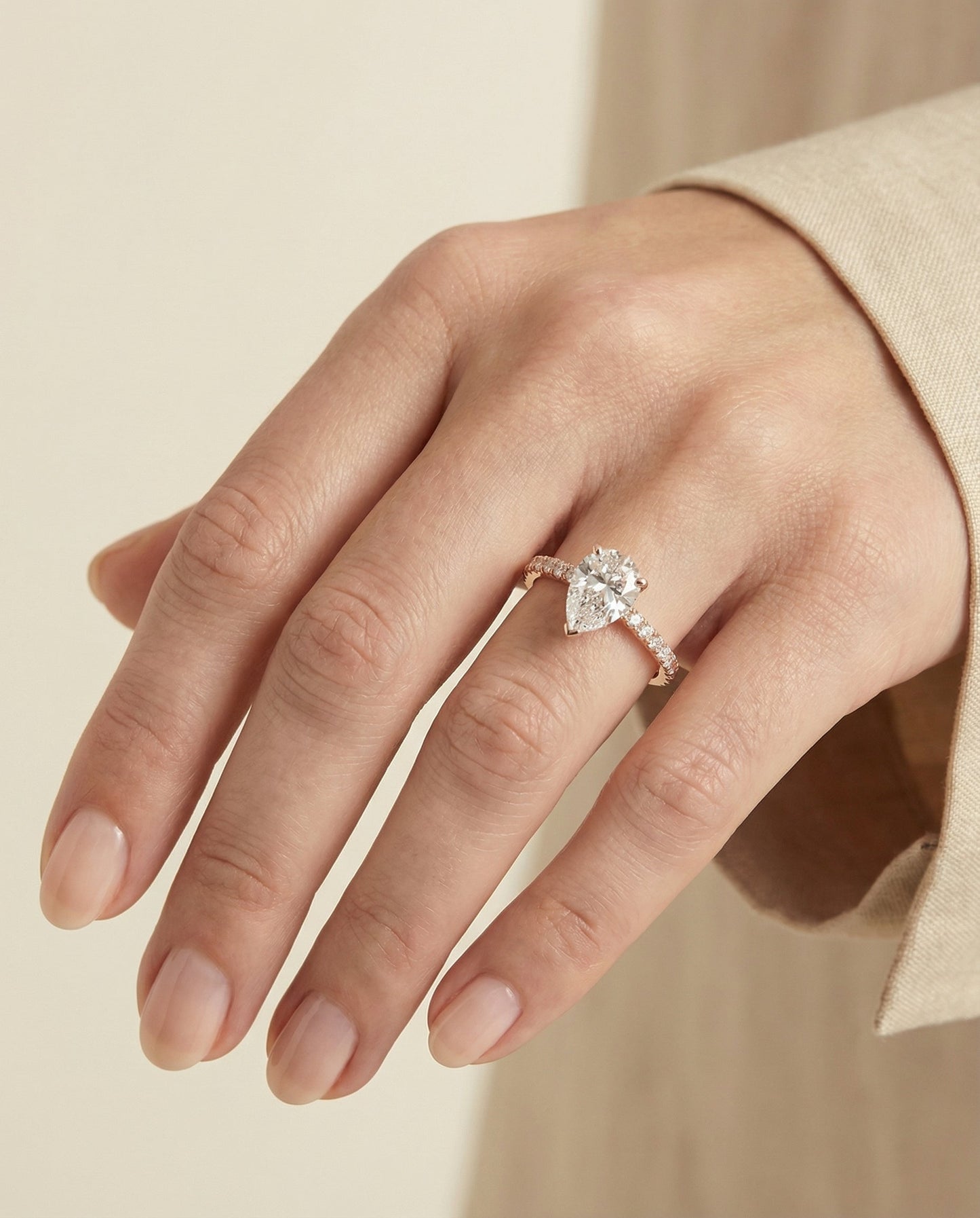 Classic Linear French Pavé Pear Shape, in 14K Rose Gold – lifestyle shot | RockHer