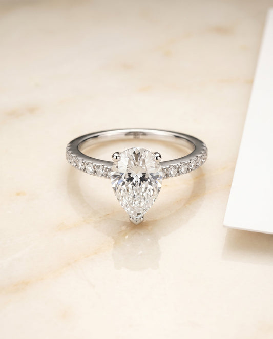 Norah Select Classic Linear French Pave Pear Shape Solitaire in 18K White Gold – view 1