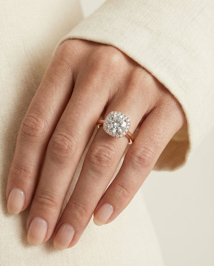 Round Brilliant, Classic Prong Diamond Halo, in 14K Rose Gold, pave setting – lifestyle shot | RockHer