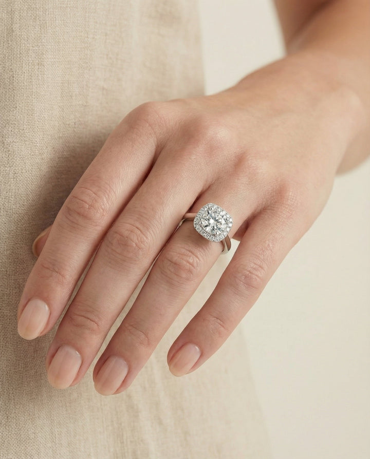Round Brilliant, Classic Prong Diamond Halo, in Platinum, pave setting – lifestyle shot | RockHer
