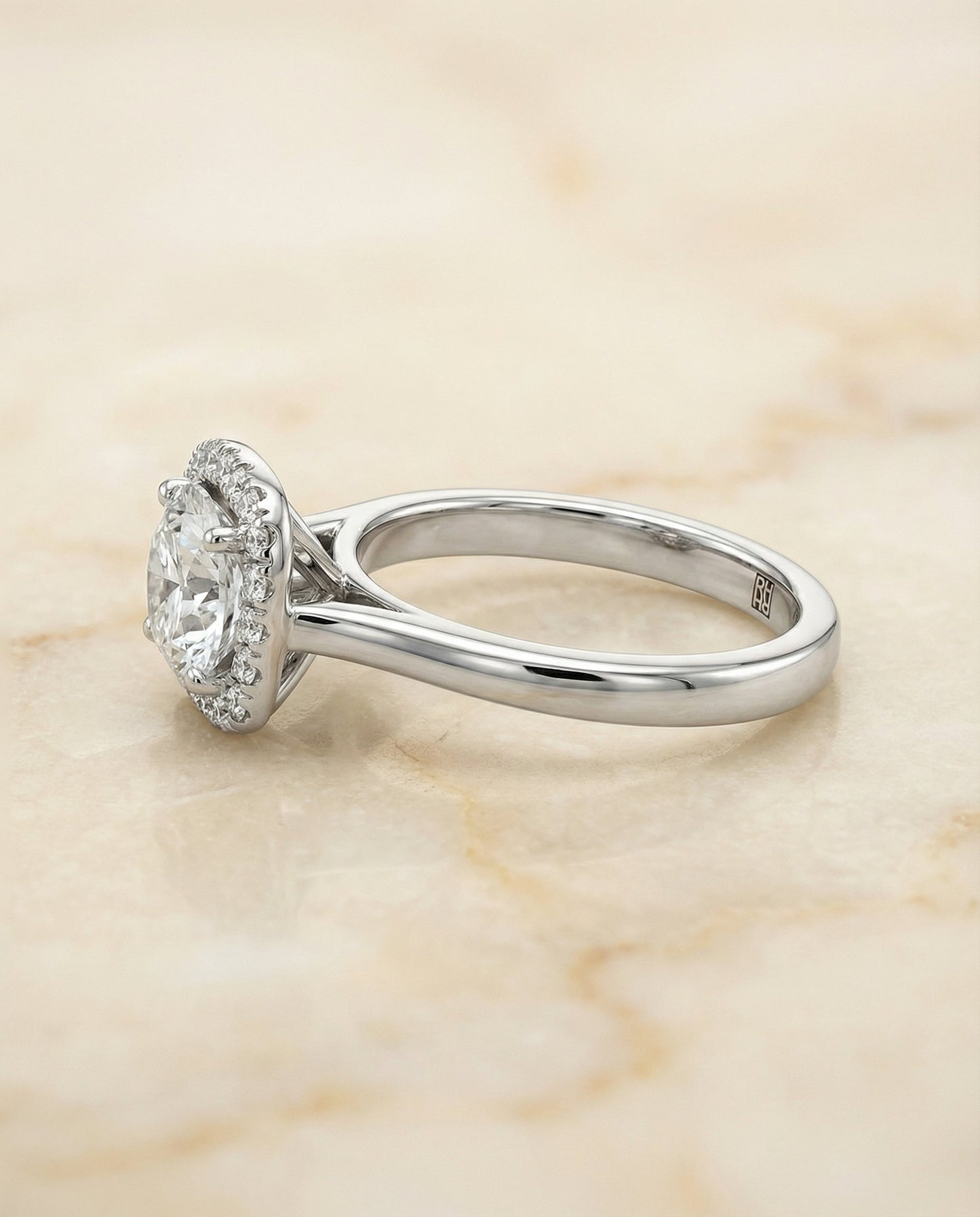 Round Brilliant, Classic Prong Diamond Halo, in Platinum, pave setting – side profile | RockHer