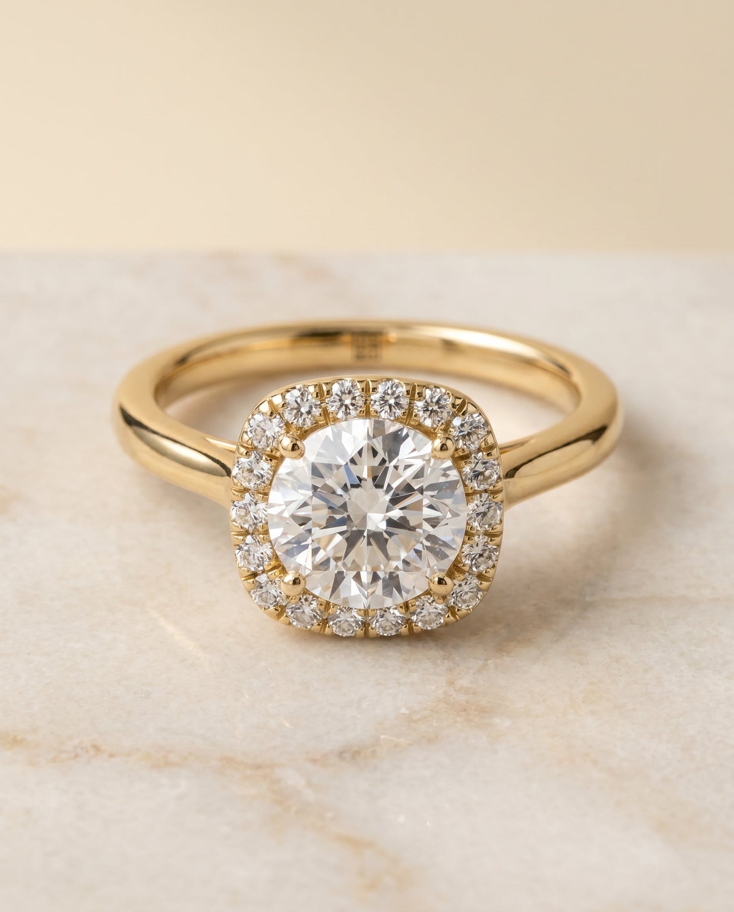 Round Brilliant, Classic Prong Diamond Halo, in 18K Yellow Gold, pave setting – angled view | RockHer