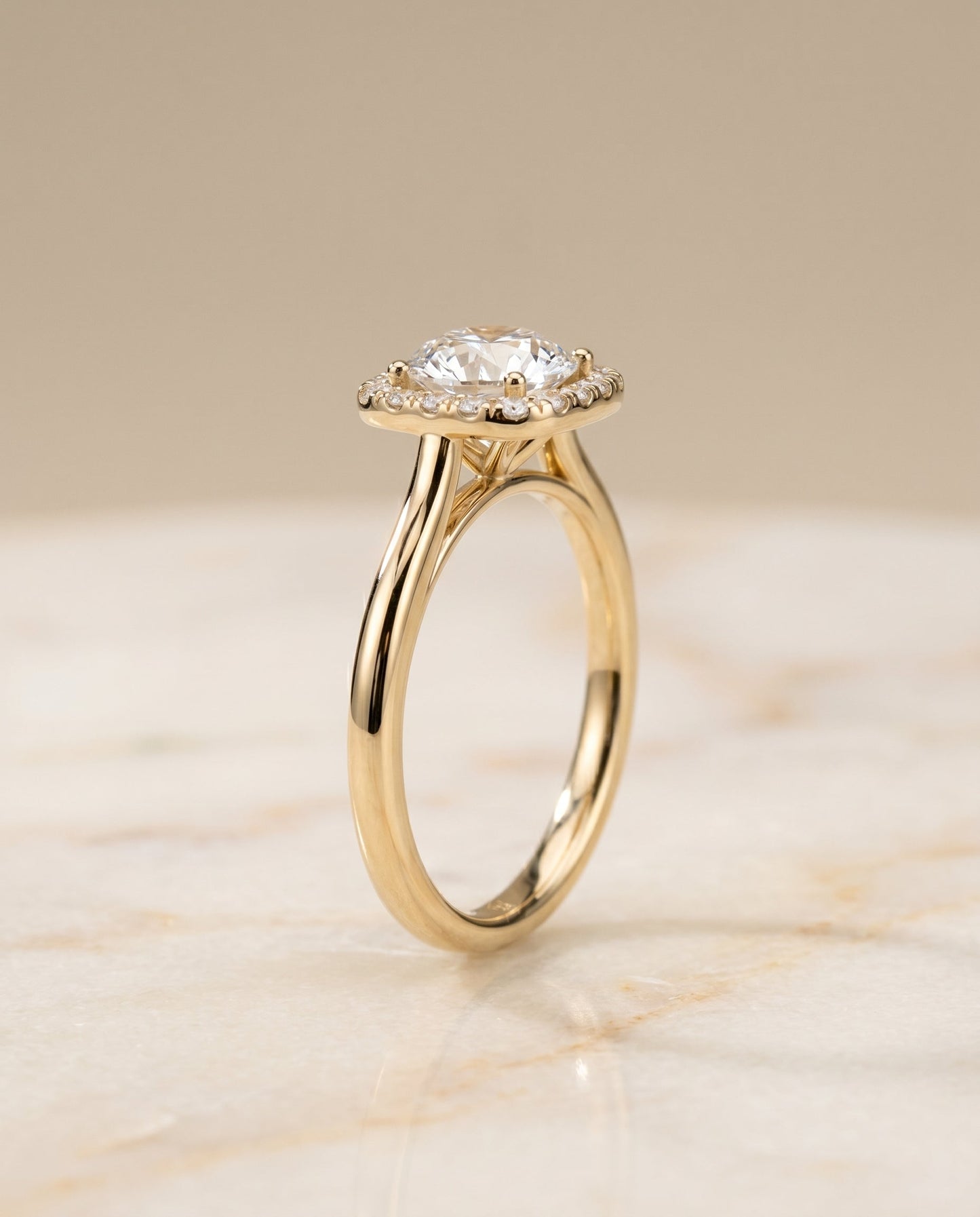 Round Brilliant, Classic Prong Diamond Halo, in 18K Yellow Gold, pave setting – front view | RockHer