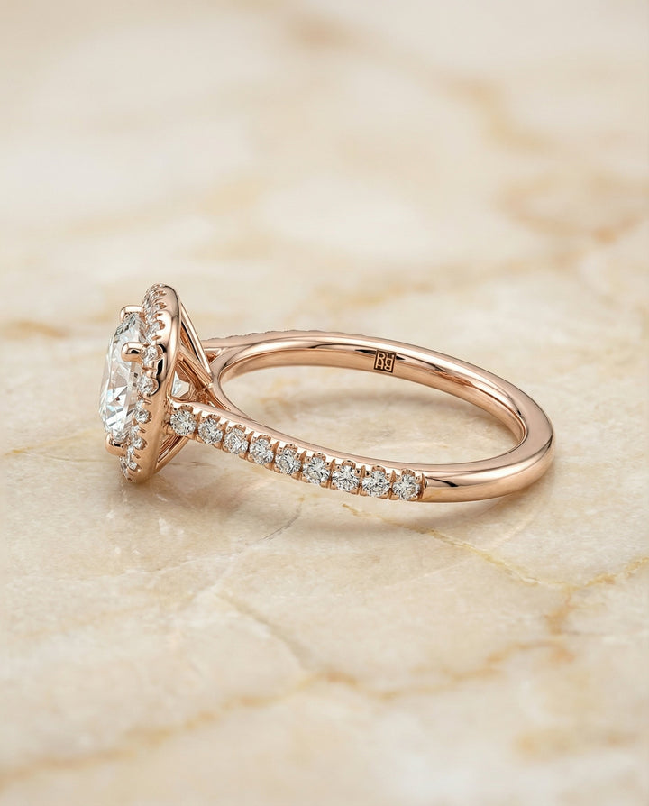 Round Brilliant, Classic Prong Halo, in 14K Rose Gold, pave setting – side profile | RockHer