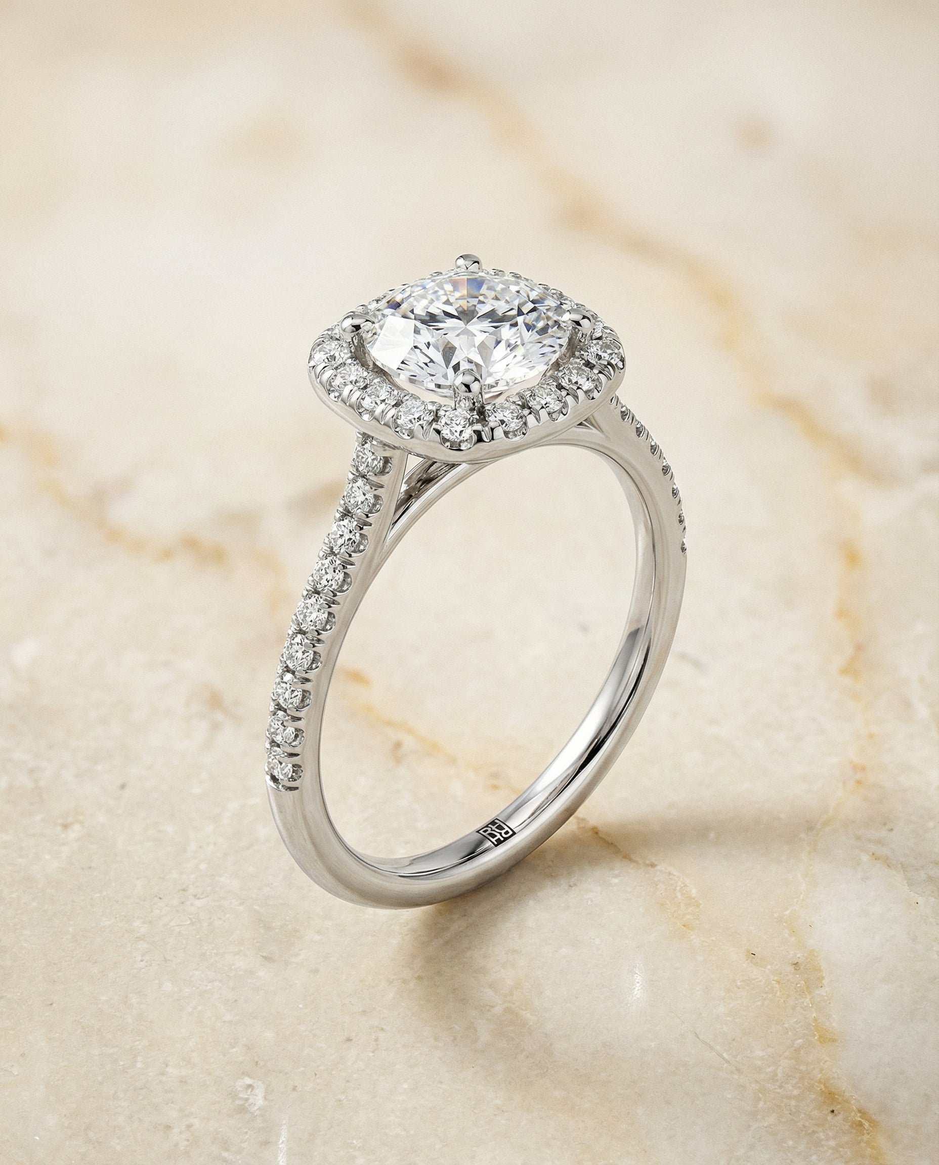 Round Brilliant, Classic Prong Halo, in Platinum, pave setting – front view | RockHer