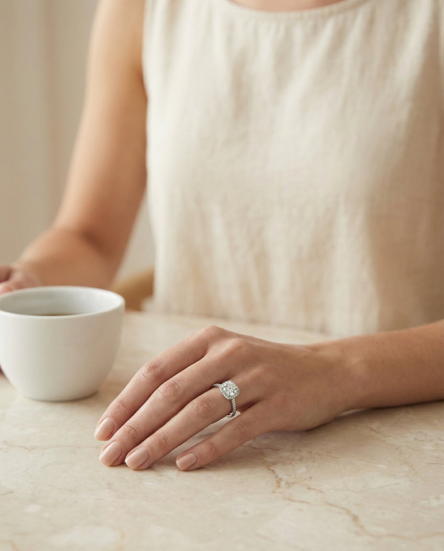Round Brilliant, Classic Prong Halo, in Platinum, pave setting – lifestyle shot | RockHer