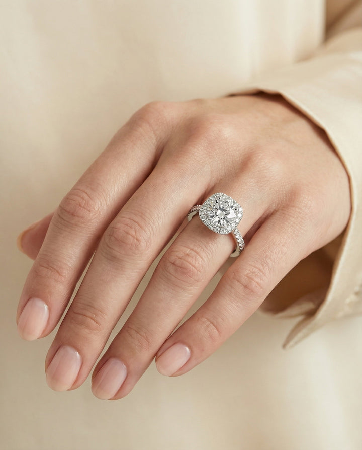 Round Brilliant, Classic Prong Halo, in Platinum, pave setting – lifestyle shot | RockHer