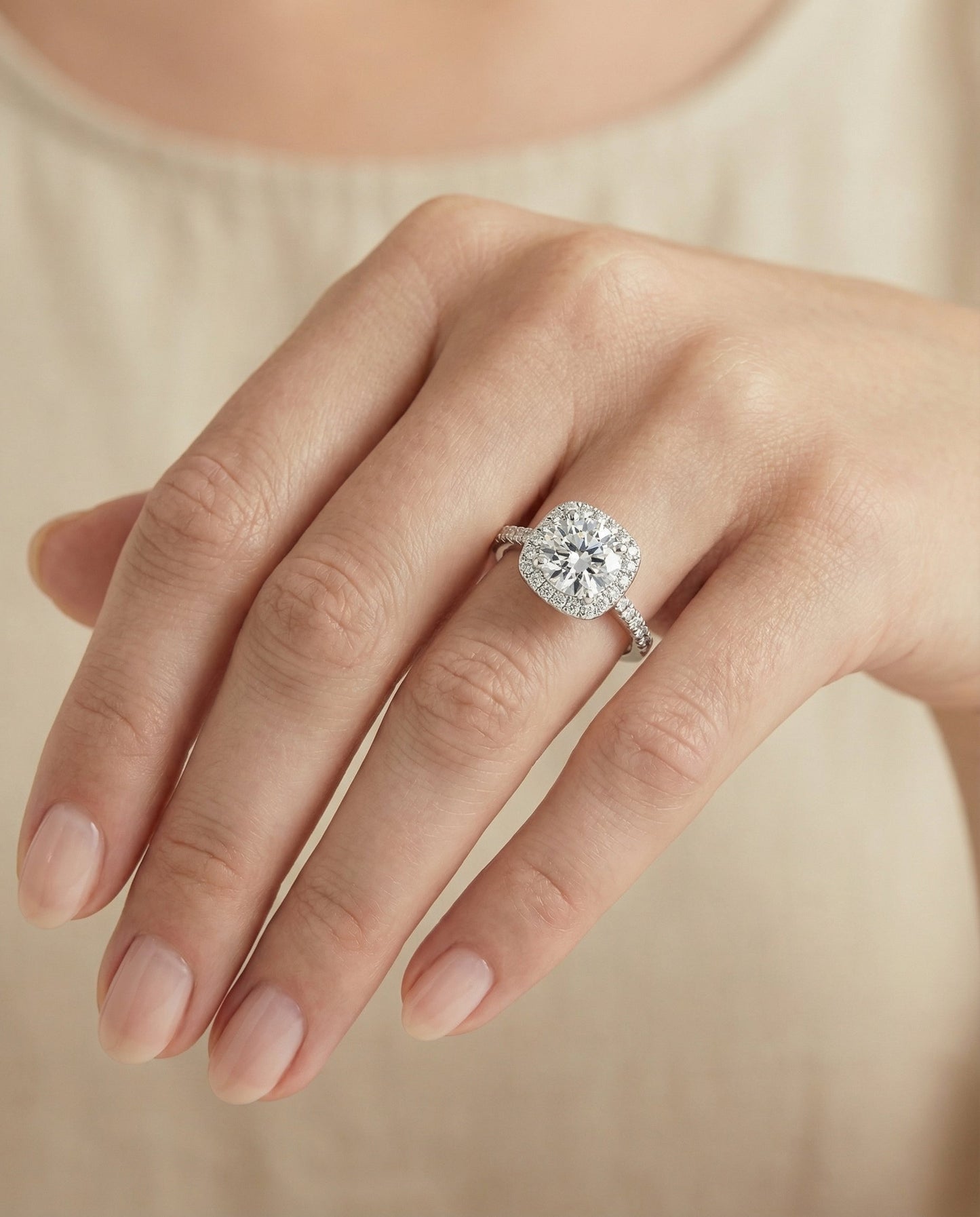 Round Brilliant, Classic Prong Halo, in Platinum, pave setting – lifestyle shot | RockHer