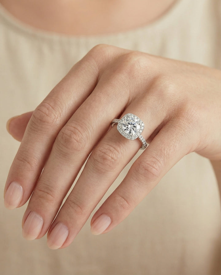 Round Brilliant, Classic Prong Halo, in Platinum, pave setting – lifestyle shot | RockHer