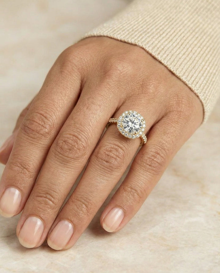 Round Brilliant, Classic Prong Halo, in 18K Yellow Gold, pave setting – lifestyle shot | RockHer