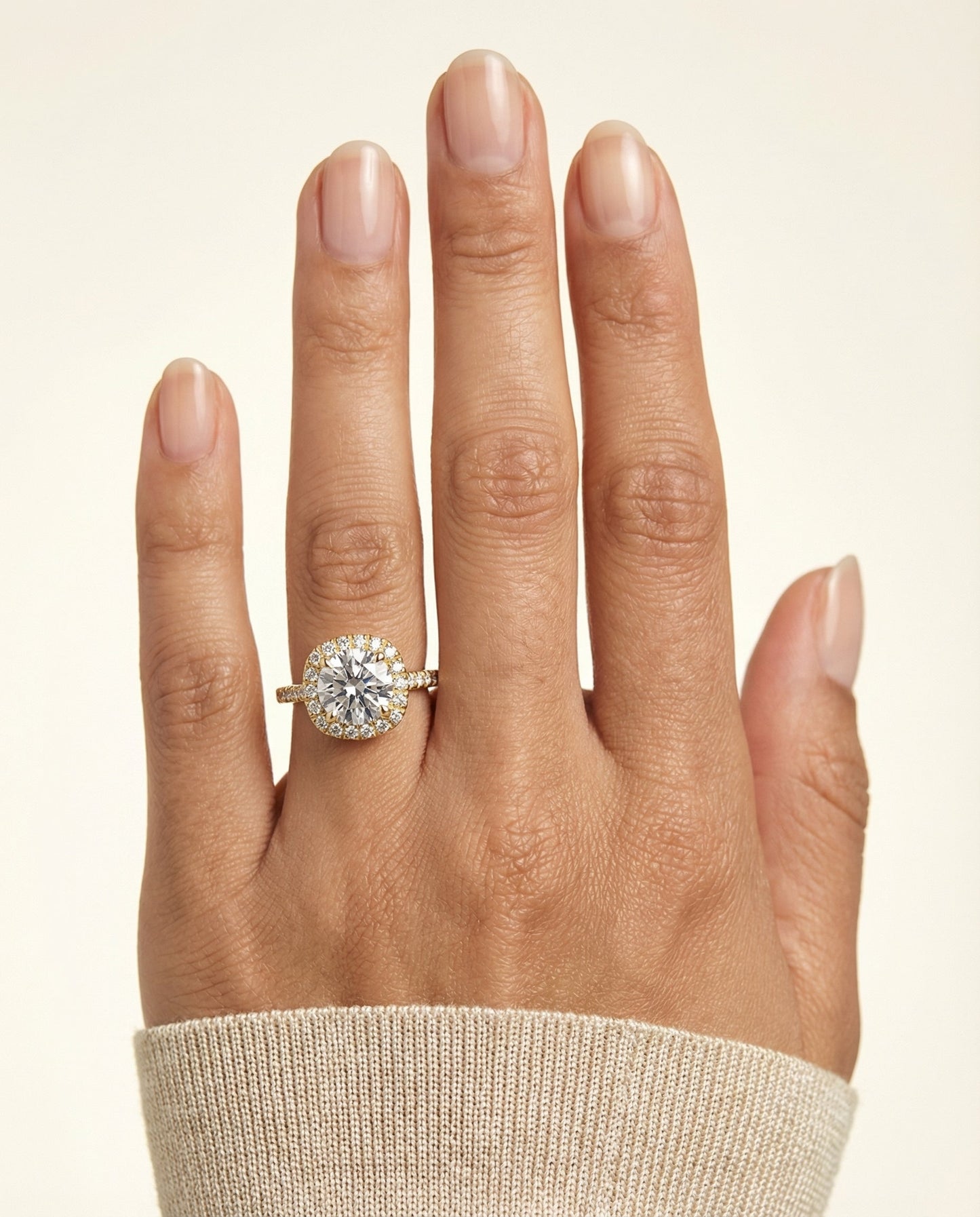 Round Brilliant, Classic Prong Halo, in 18K Yellow Gold, pave setting – lifestyle shot | RockHer