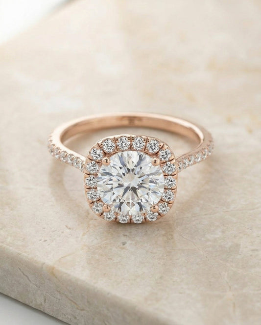 Round Brilliant, Classic Shared Prong Halo Round, in 14K Rose Gold, pave setting – angled view | RockHer