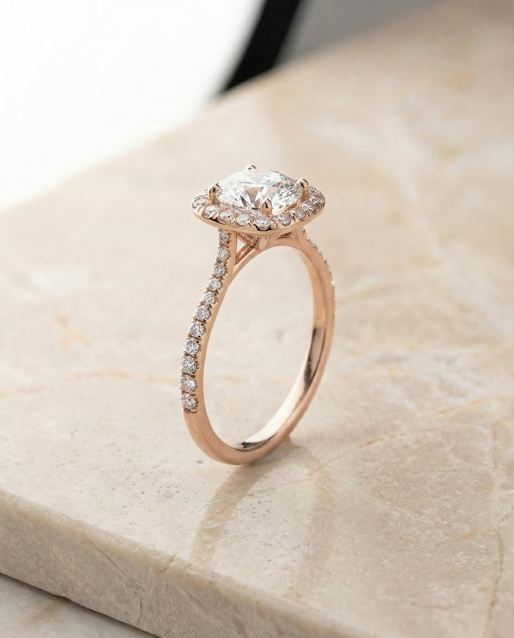Round Brilliant, Classic Shared Prong Halo Round, in 14K Rose Gold, pave setting – front view | RockHer