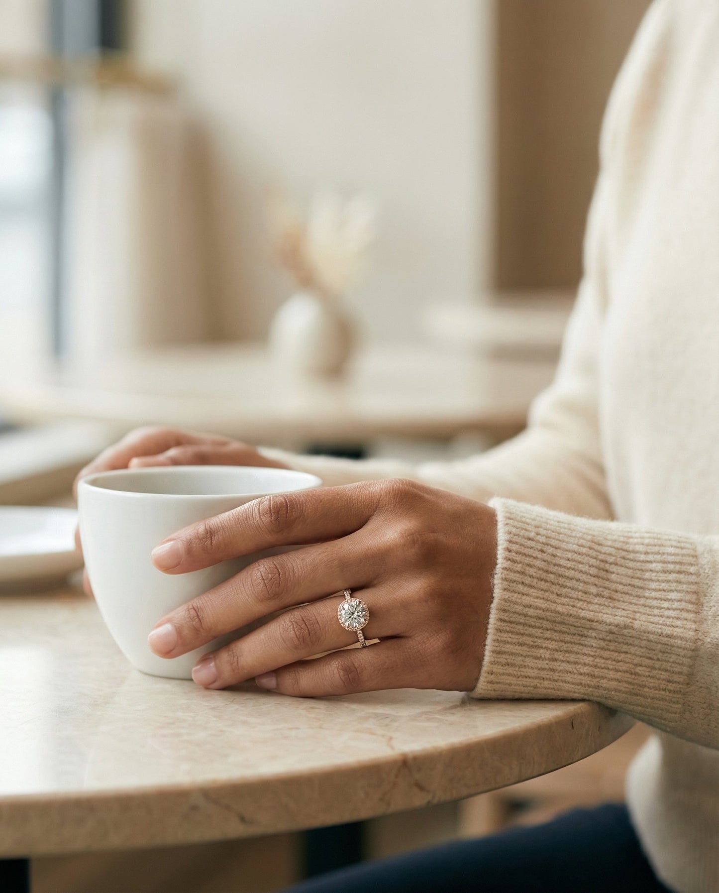 Round Brilliant, Classic Shared Prong Halo Round, in 14K Rose Gold, pave setting – lifestyle shot | RockHer