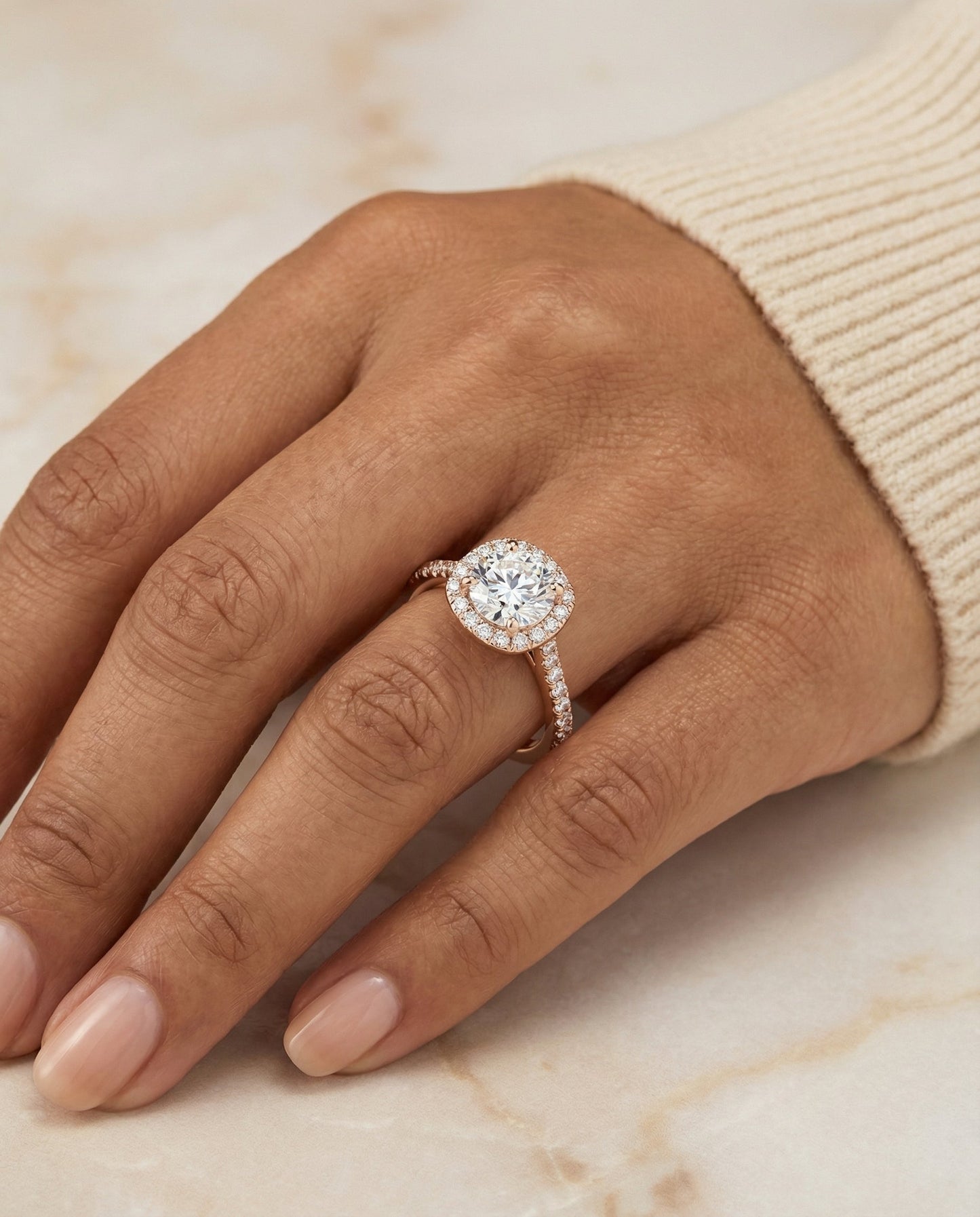 Round Brilliant, Classic Shared Prong Halo Round, in 14K Rose Gold, pave setting – lifestyle shot | RockHer