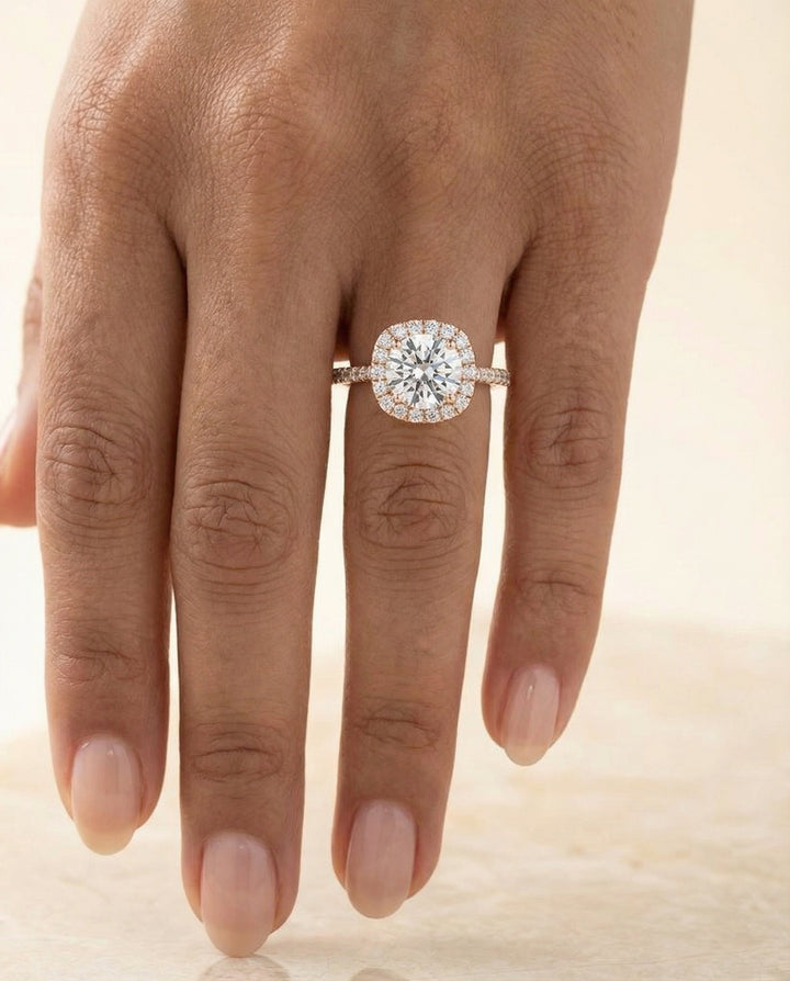 Round Brilliant, Classic Shared Prong Halo Round, in 14K Rose Gold, pave setting – lifestyle shot | RockHer