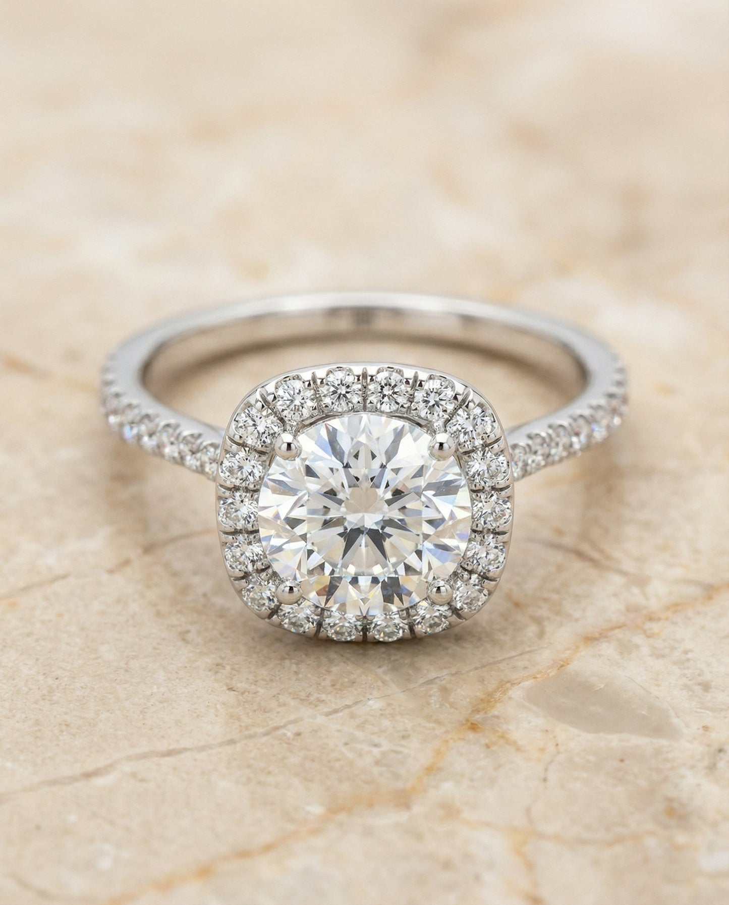 Round Brilliant, Classic Shared Prong Halo Round, in Platinum, pave setting – angled view | RockHer