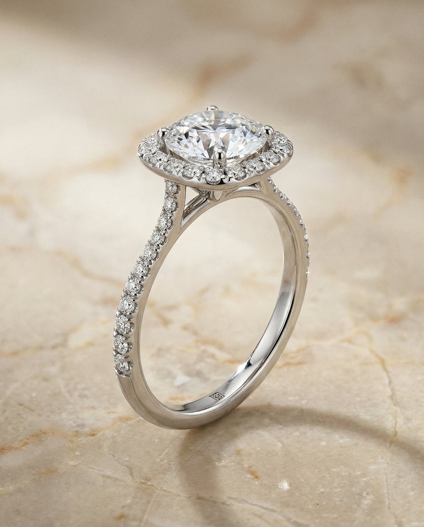 Round Brilliant, Classic Shared Prong Halo Round, in Platinum, pave setting – front view | RockHer