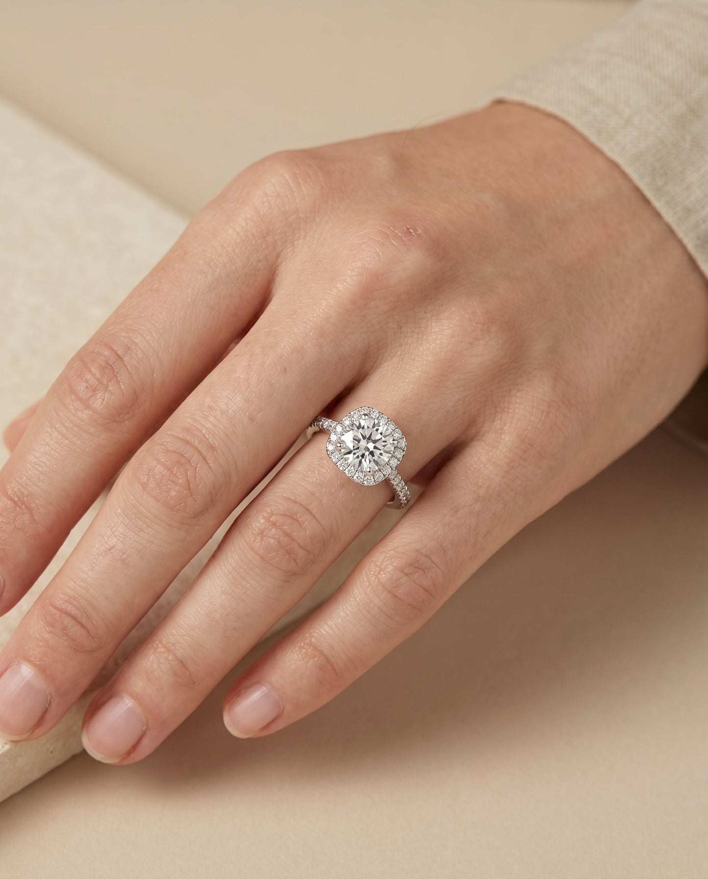 Round Brilliant, Classic Shared Prong Halo Round, in Platinum, pave setting – lifestyle shot | RockHer