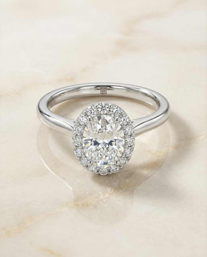 Etta Select classic shared prong halo oval oval ring in 14K White Gold — alt angle — RockHer
