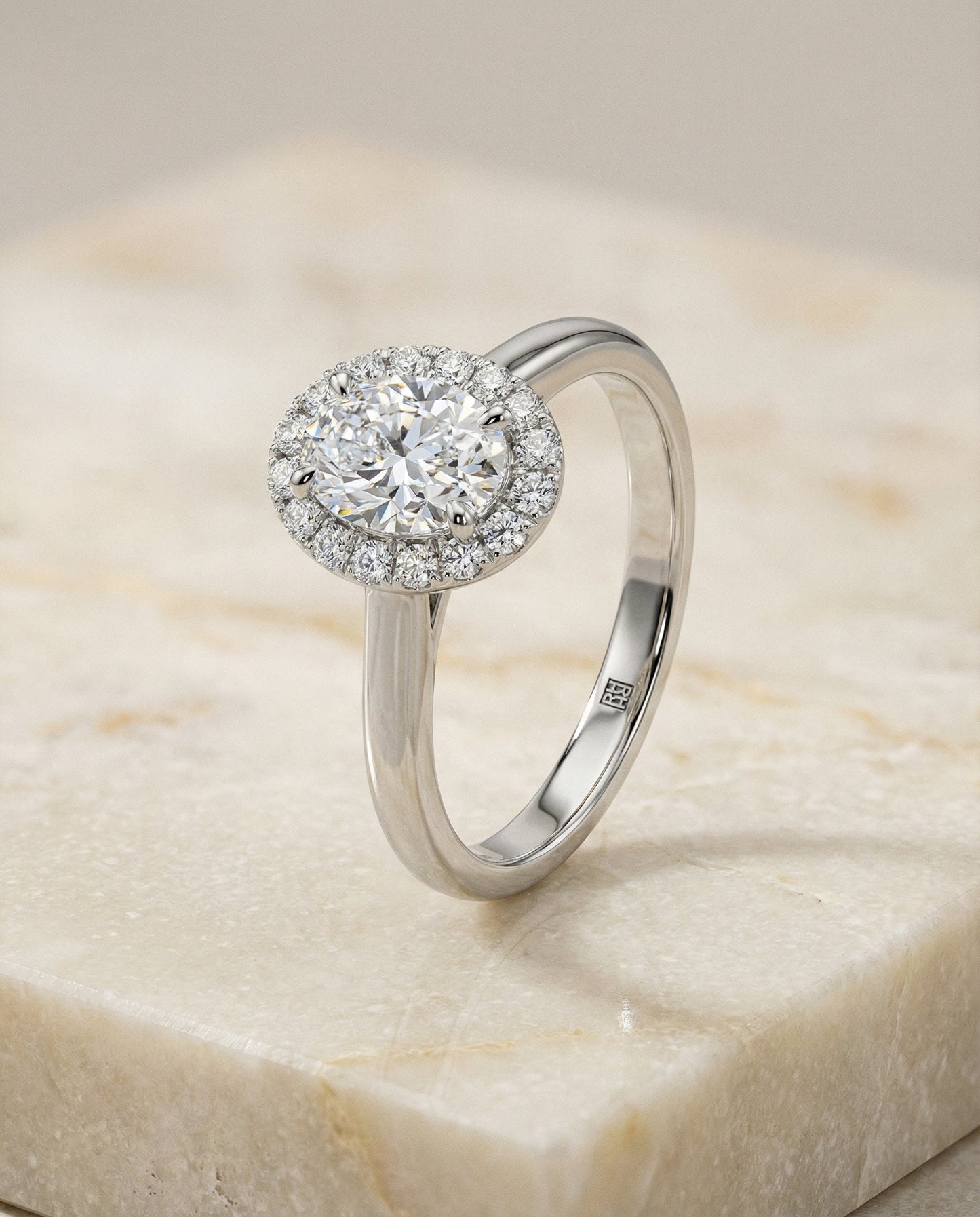 Classic Shared Prong Halo Oval, in Platinum, pave setting – front view | RockHer