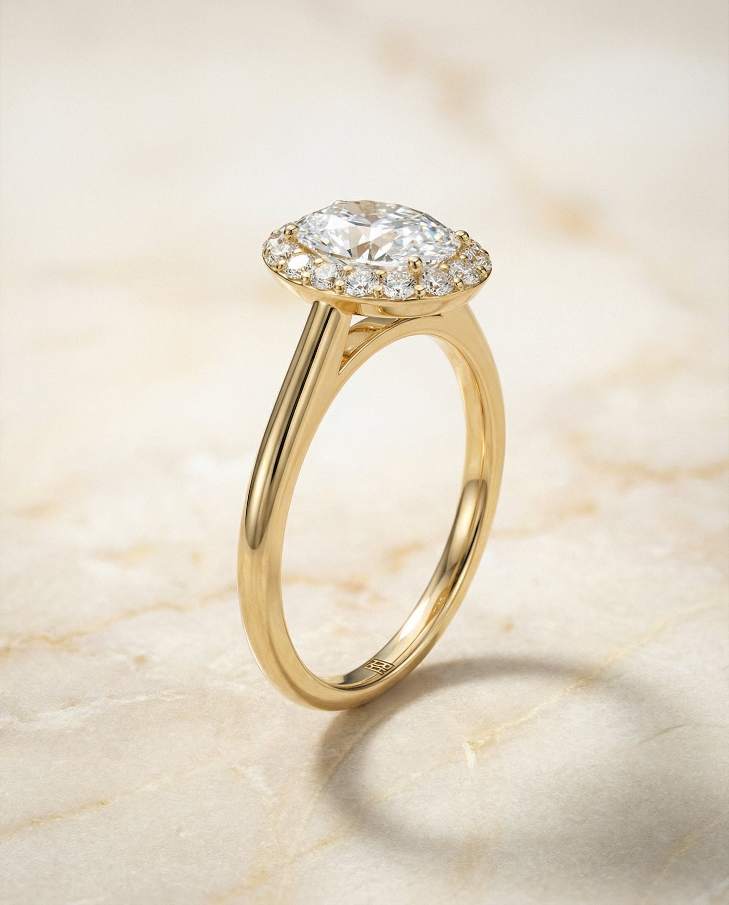 Classic Shared Prong Halo Oval, in 18K Yellow Gold, pave setting – front view | RockHer