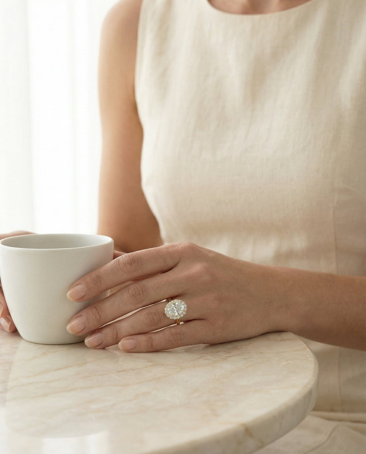 Etta Select classic shared prong halo oval oval ring in 14K Yellow Gold — lifestyle — RockHer