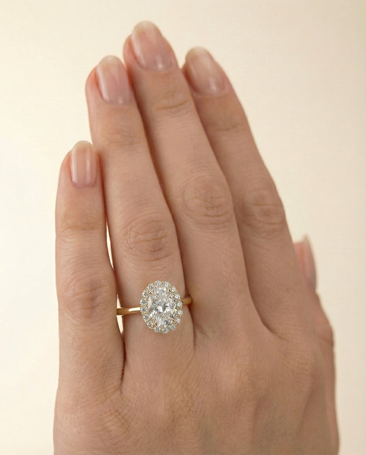 Classic Shared Prong Halo Oval, in 18K Yellow Gold, pave setting – lifestyle shot | RockHer