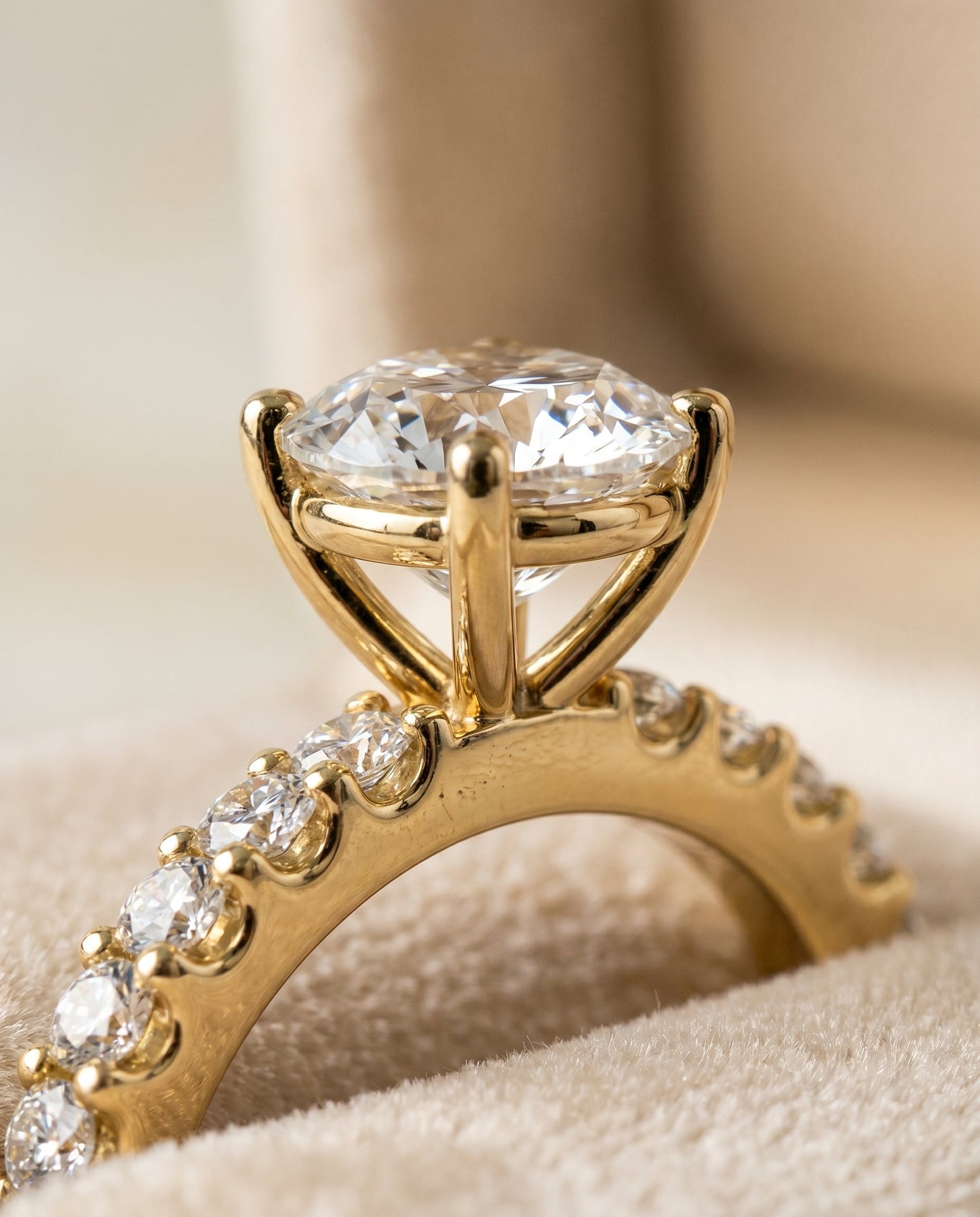 Round Brilliant, Classic Shared Prong Linear Pavé, in 18K Yellow Gold – detail view | RockHer