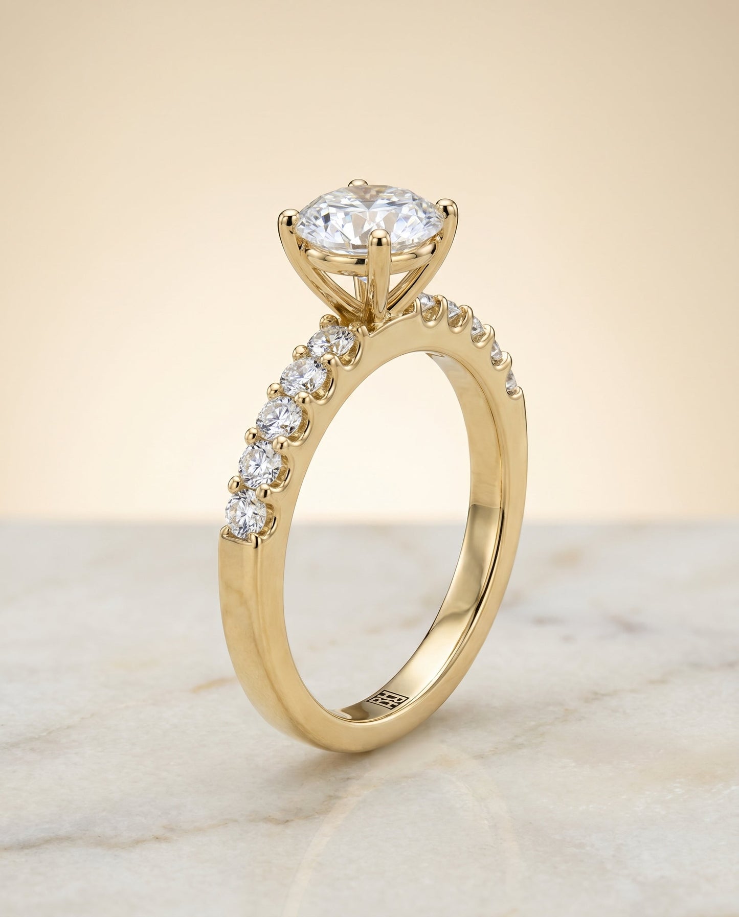Round Brilliant, Classic Shared Prong Linear Pavé, in 18K Yellow Gold – front view | RockHer