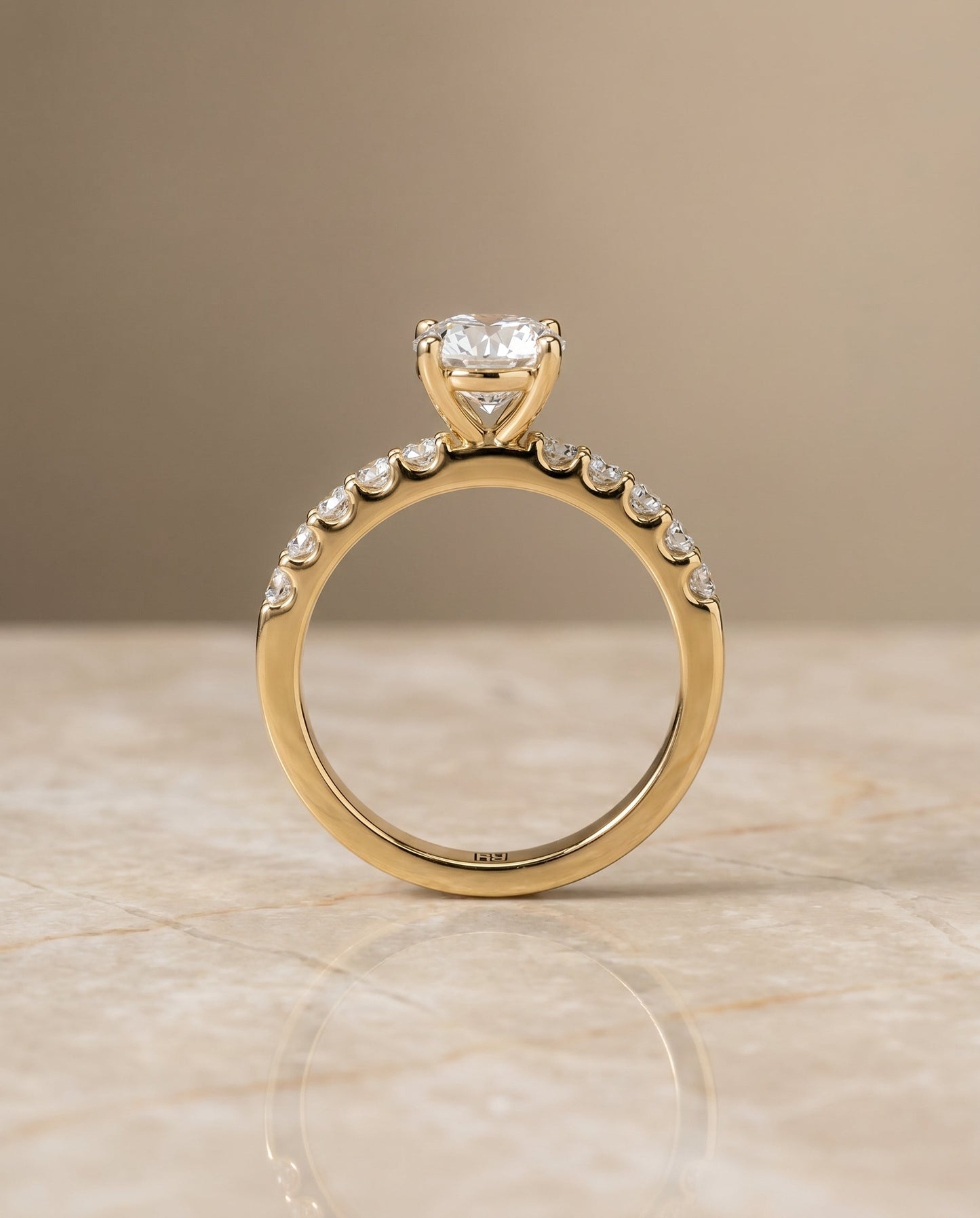 Round Brilliant, Classic Shared Prong Linear Pavé, in 18K Yellow Gold – side profile | RockHer