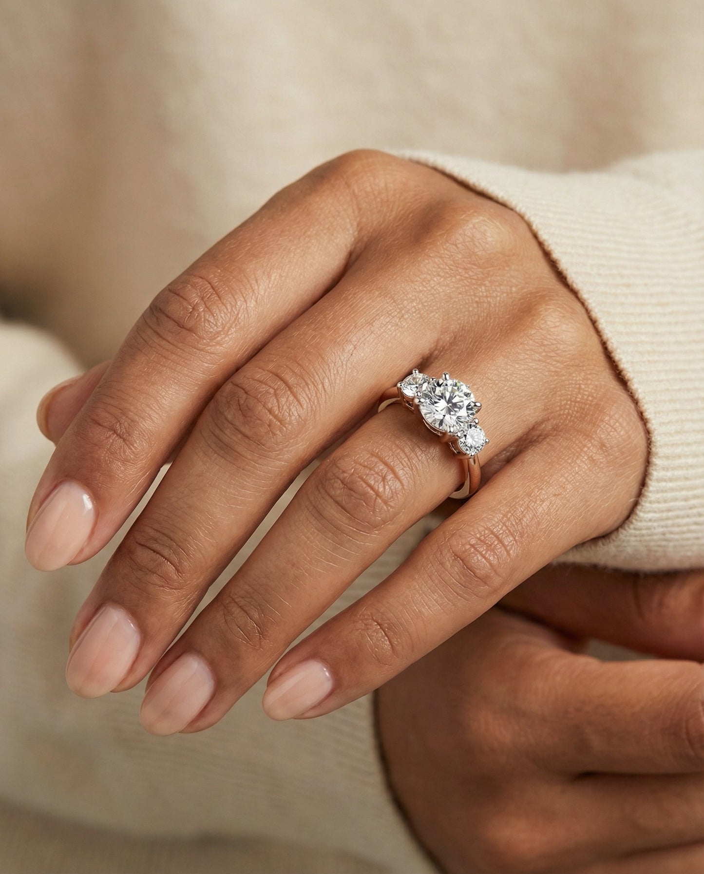 Round Brilliant, Classic Three Stone Round, in 14K Rose Gold, prong setting – lifestyle shot | RockHer