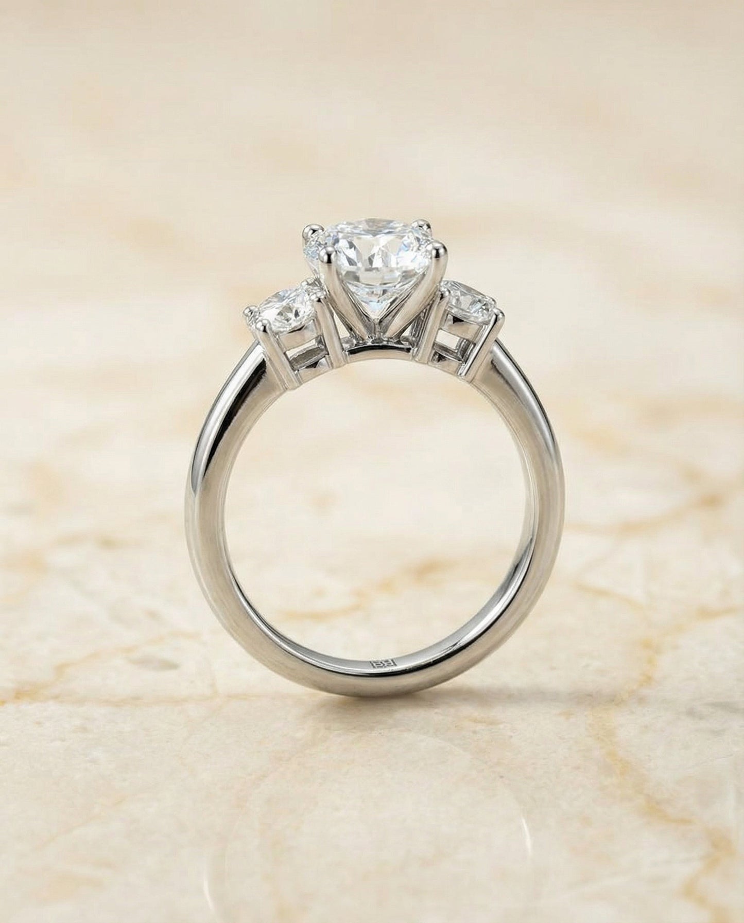 Round Brilliant, Classic Three Stone Round, in Platinum, prong setting – side profile | RockHer
