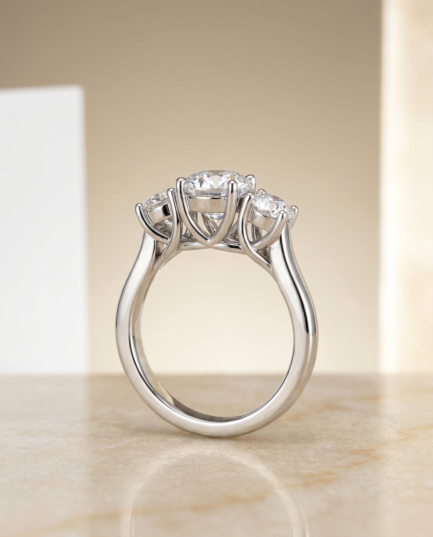Natalie Select Classic Three Stone Solitaire in Platinum – view 2