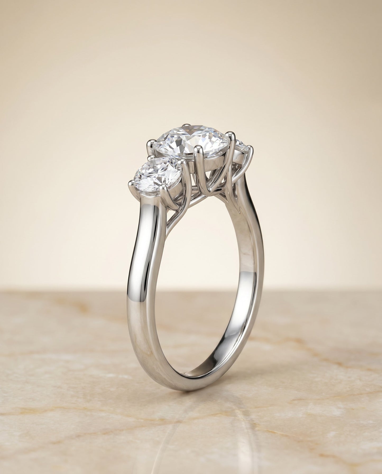 Natalie Select Classic Three Stone Solitaire in Platinum – view 1