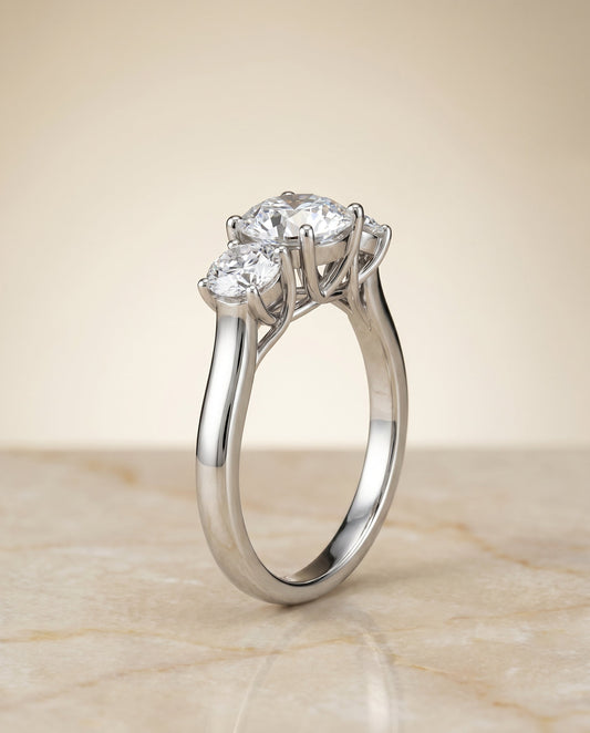 Natalie Select Classic Three Stone Solitaire in Platinum – view 1