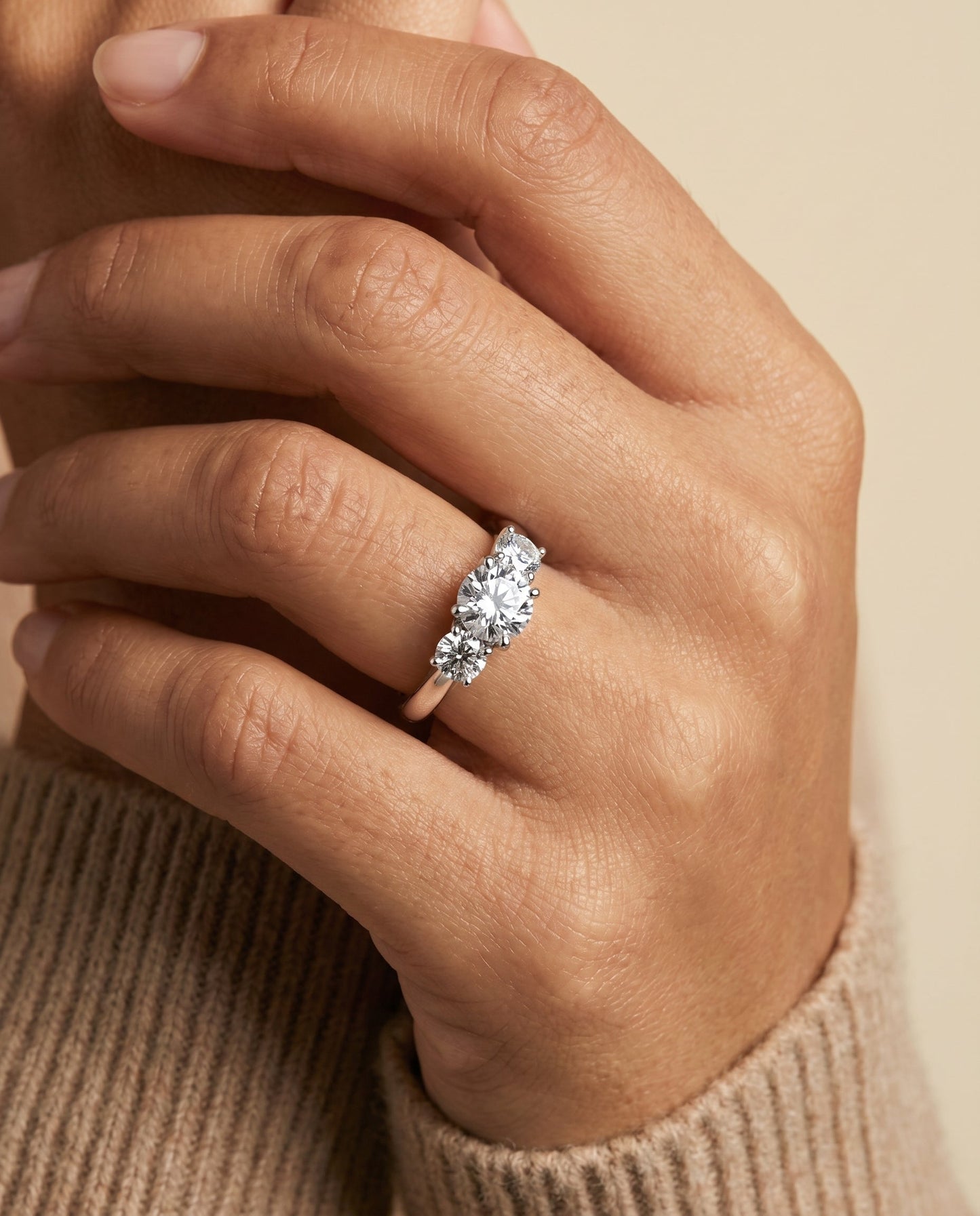 Natalie Select Classic Three Stone Solitaire in Platinum – view 3