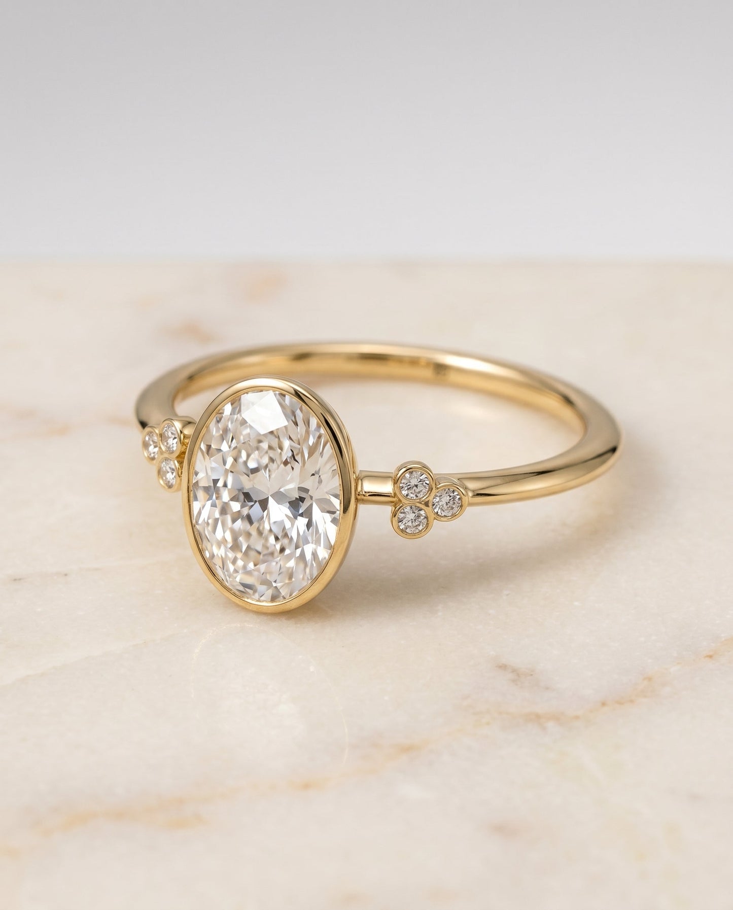 The Selena Bezel Solitaire Engagement Ring Setting for Oval Diamonds in 18K Yellow Gold | RockHer