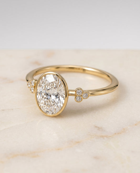 The Selena Bezel Solitaire Engagement Ring Setting for Oval Diamonds in 18K Yellow Gold | RockHer