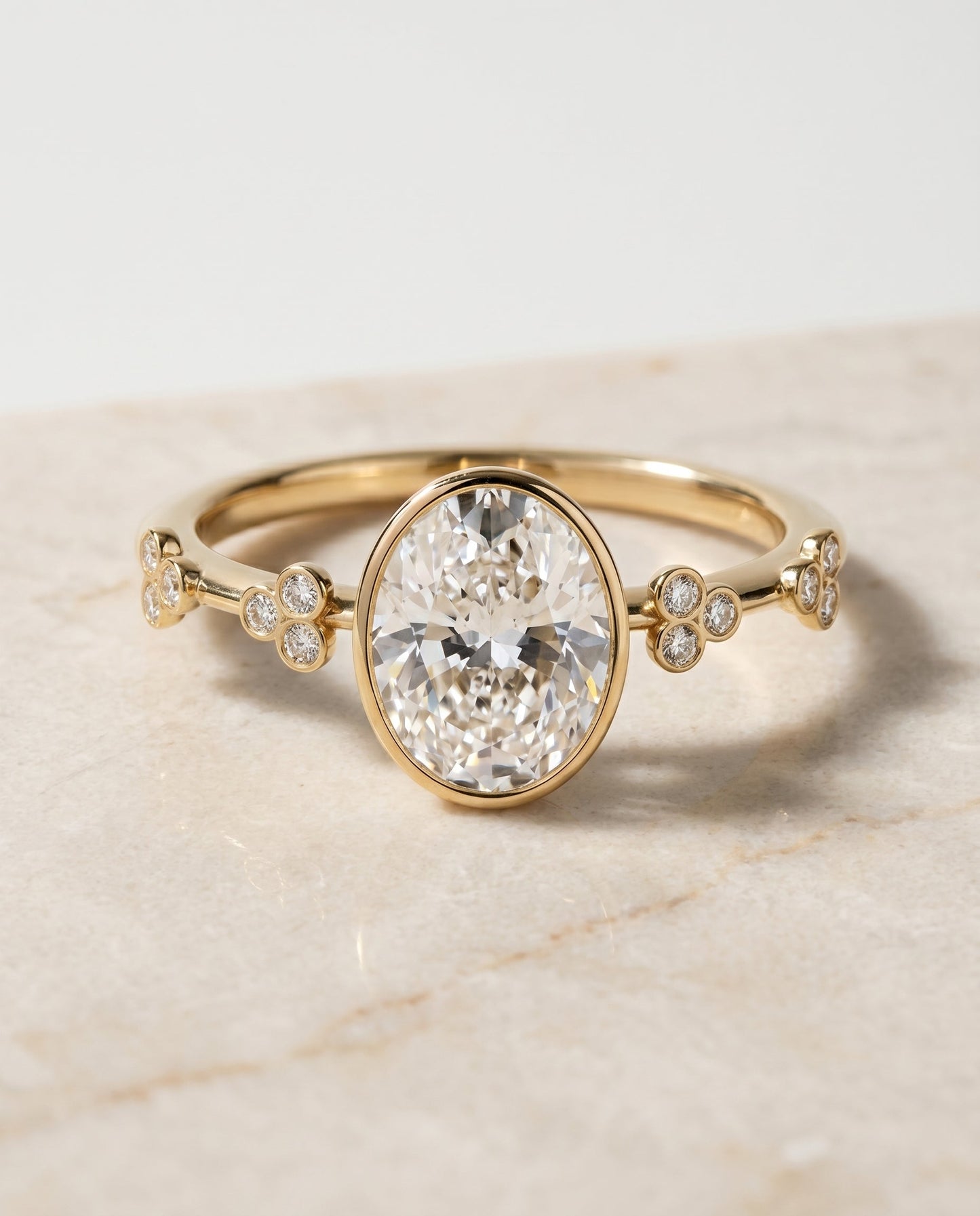 The Miley Bezel Solitaire Engagement Ring Setting for Oval Diamonds in 18K Yellow Gold | RockHer