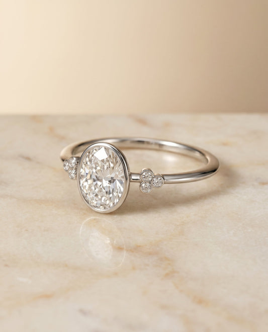 The Selena Bezel Solitaire Engagement Ring Setting for Oval Diamonds in 18K White Gold | RockHer