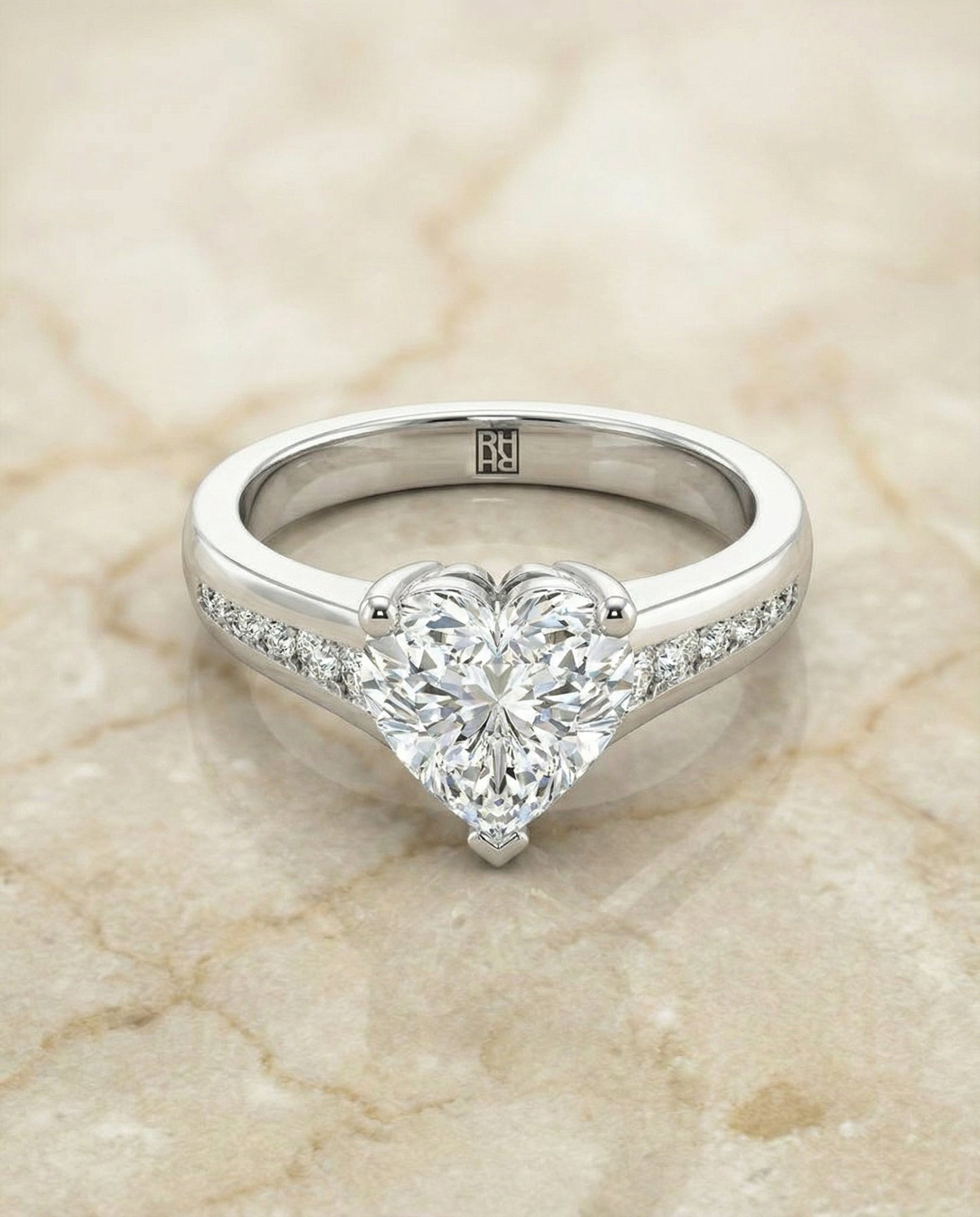 Contemporary Tapered Channel Heart Shape, in Platinum – angled view | RockHer