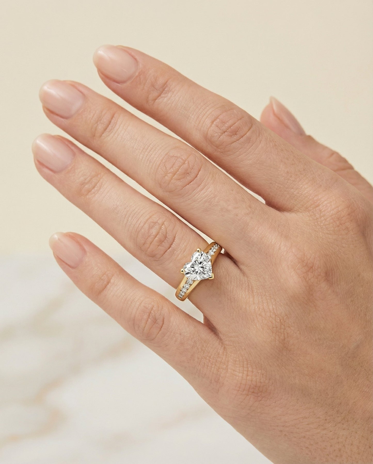 Contemporary Tapered Channel Heart Shape, in 18K Yellow Gold – lifestyle shot | RockHer