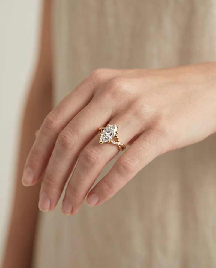 Criss Cross Bypass Twist Marquise, in 18K Yellow Gold – lifestyle shot | RockHer