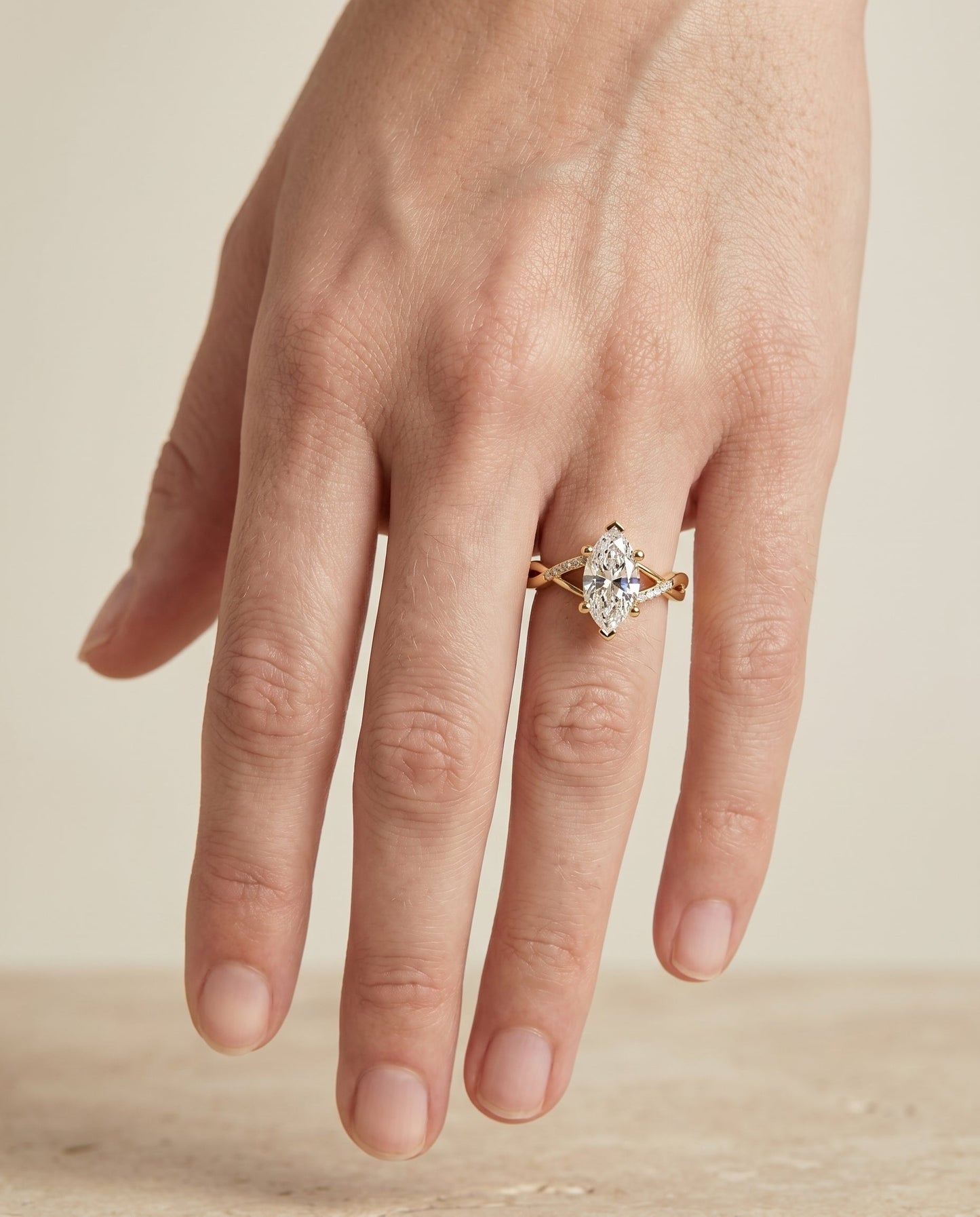 Criss Cross Bypass Twist Marquise, in 18K Yellow Gold – lifestyle shot | RockHer