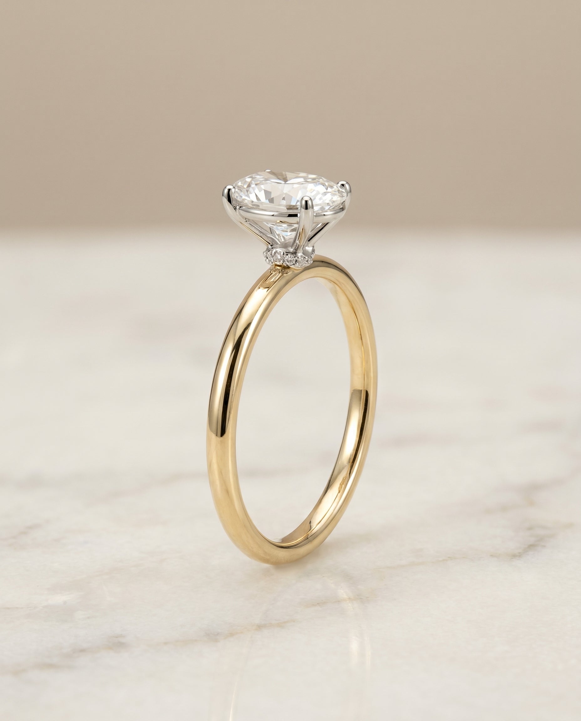 Cyndi Select Curved Hidden Halo Solitaire Oval in 14K Yellow Gold – view 1